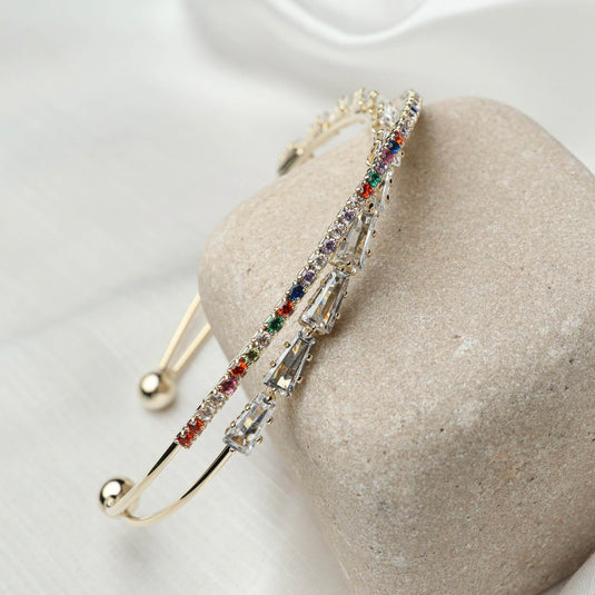 QuinShine elegant rainbow gemstone bracelet with multicolored stones on a gold band
