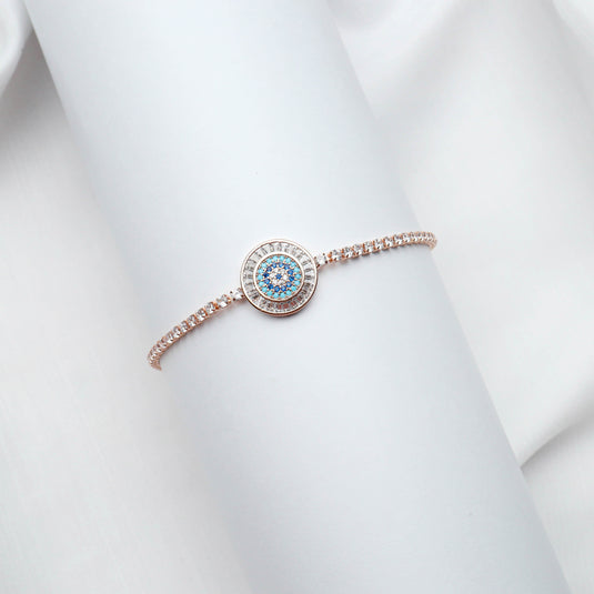 QuinShine delicate sapphire accent bracelet with sparkling stones on a white wrist display
