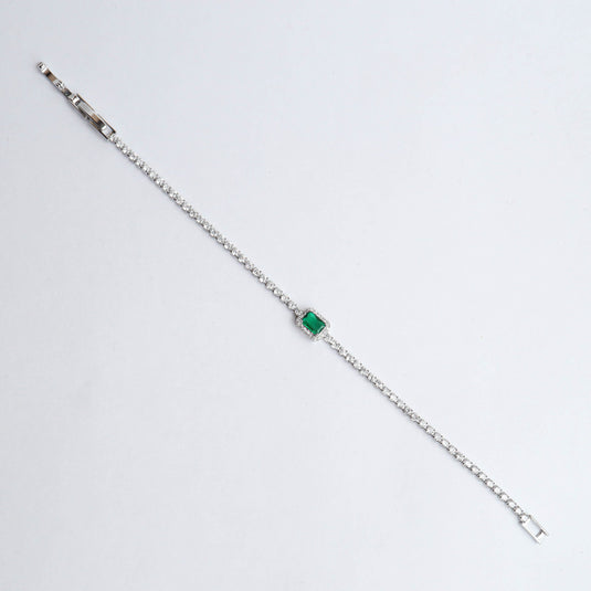 QuinShine minimalist gemstone bracelet with a silver chain and a green rectangular gemstone centerpiece
