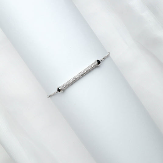 QuinShine minimalist silver bracelet with a slim, sparkling bar design on a delicate chain