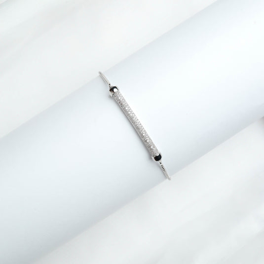 QuinShine minimalist silver bracelet featuring a sleek bar design with sparkling accents