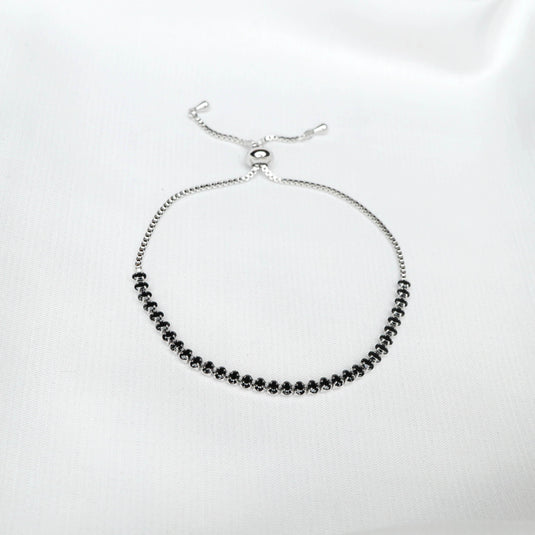 Minimalist silver Chain bracelet with Black Stone featuring adjustable clasp on white background