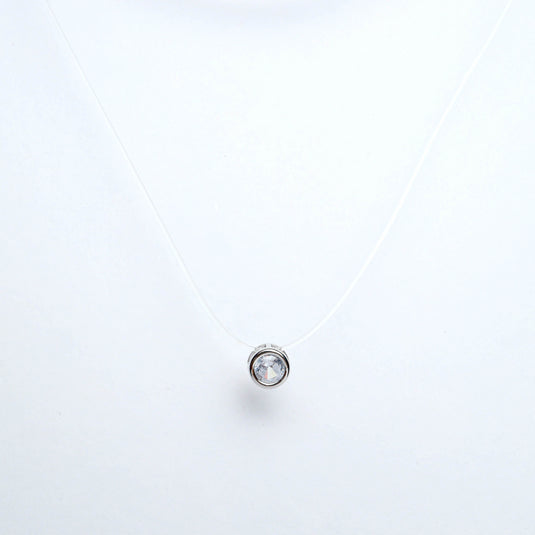 QuinShine minimalist silver necklace with a small round gemstone pendant on a delicate chain