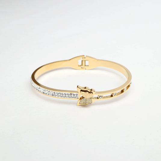 QuinShine Monarch Glow Bracelet gold bangle with butterfly charm and crystal accents
