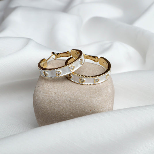 QuinShine Moonlit Dazzle Hoops gold hoop earrings with white enamel and heart details
