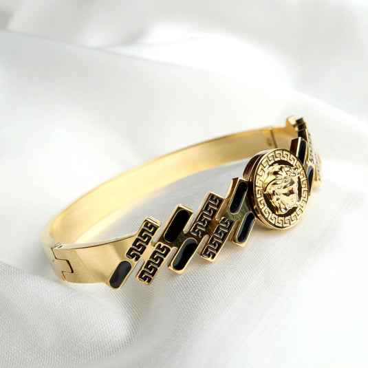QuinShine Regal Medallion Bracelet in gold with black accents and intricate lion head design