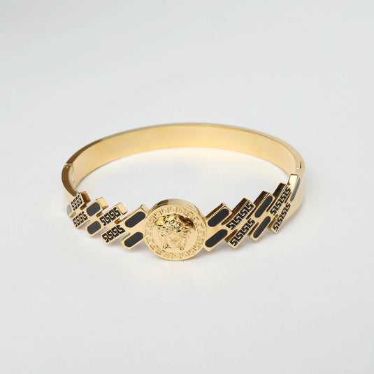 Gold QuinShine Regal Medallion Bracelet with black Greek key design and lion center medallion