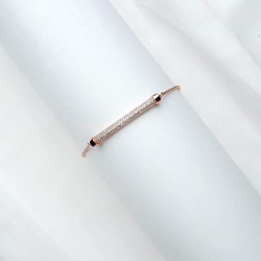 QuinShine elegant rose gold bracelet with a sparkling bar centerpiece on a white background