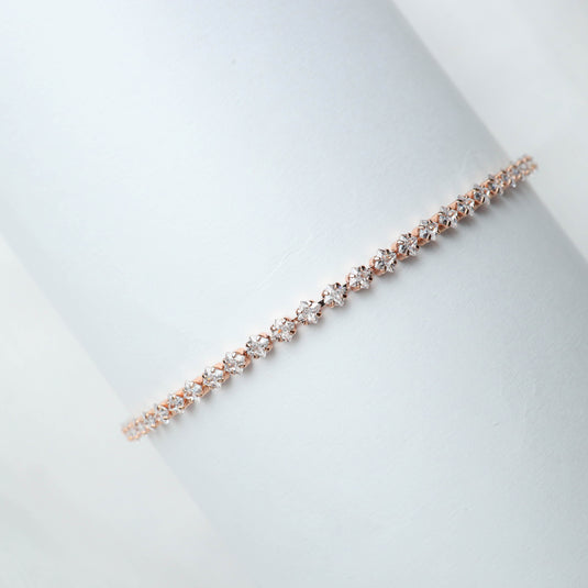 QuinShine elegant rose gold bracelet for women with sparkling round-cut stones on a white background