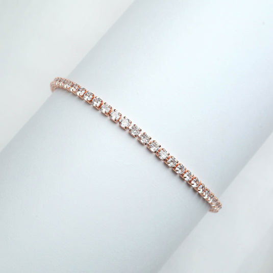 QuinShine delicate tennis bracelet with sparkling clear stones set in rose gold