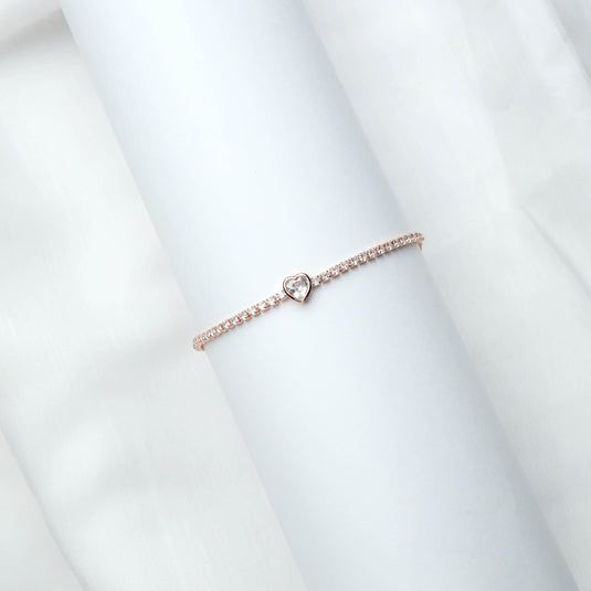 QuinShine delicate rose gold heart bracelet with a central heart-shaped charm and sparkling stones