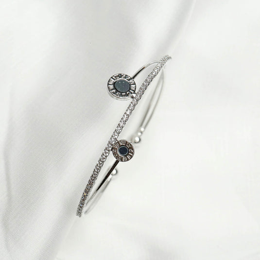 QuinShine Sentinel Sparkle Bracelet silver bangle with two round black stones and rhinestones