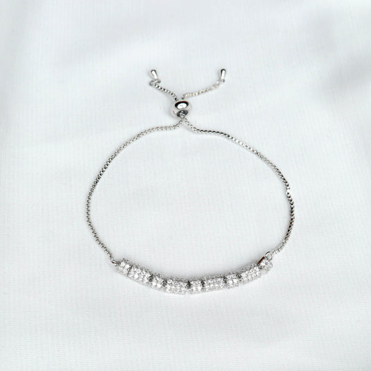 QuinShine elegant wrist bracelet with adjustable chain and sparkling crystal design on white background