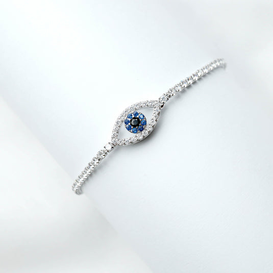 QuinShine elegant silver sapphire eye design bracelet with blue and black stones on a white background