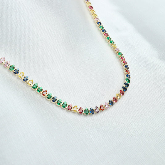 QuinShine tennis necklace colorful stones with multicolor gems set in gold on white background