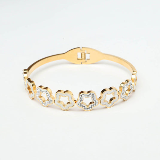 QuinShine gold bracelet with unique floral jewelry design featuring flower shapes and embedded crystals