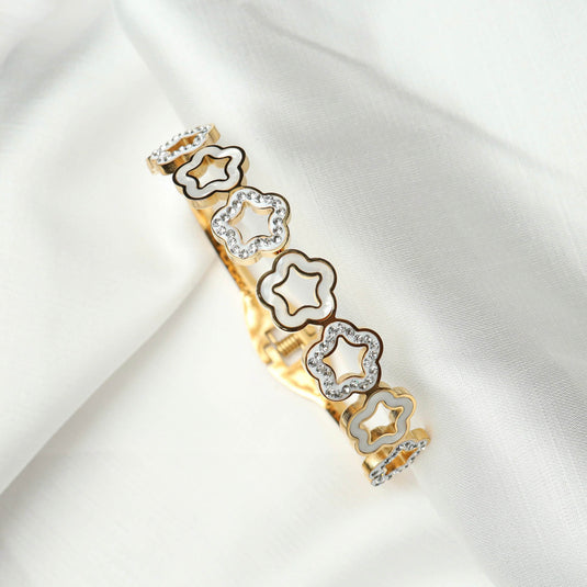QuinShine gold bracelet featuring unique floral jewelry design with white and crystal accents