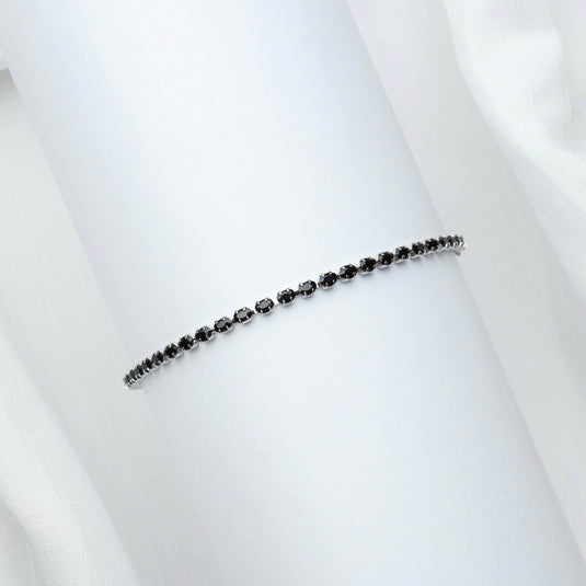 QuinShine unique minimalist Black Stone bracelet with small black stones set in a delicate silver chain