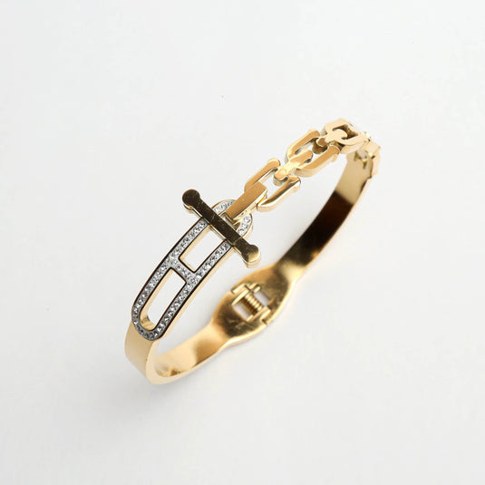 QuinShine golden equinox bracelet with gold chain links and diamond-studded geometric design