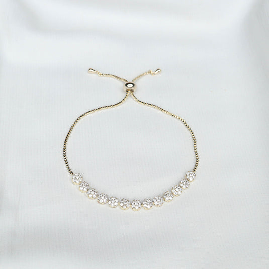 QuinShine luxury gold bracelet with adjustable chain and sparkling crystal accents on white background