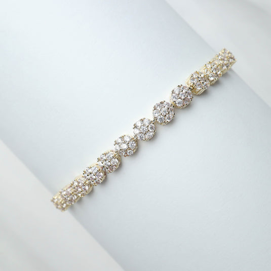 QuinShine luxury gold bracelet with circular diamond clusters on a white background