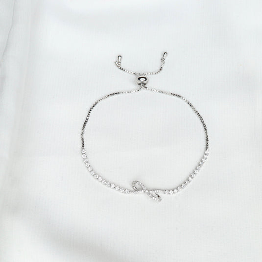 Minimalist Infinite Bow bracelet with silver chain and adjustable clasp from QuinShine Online Jewellery Store
